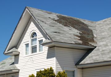 Roof repair after storm damage in Burke